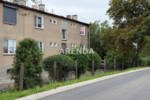 Mieszkanie z działką ogródkiem i budynkami