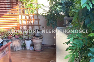 Apartament z garażem oraz biurem z ogródkiem