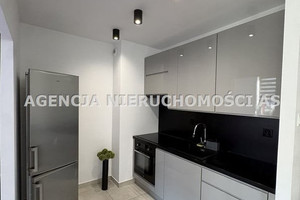 DO ZAMIESZKANIA Z MIEJSCEM POSTOJOWYM I BALKONEM