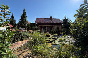 Całoroczny dom z bajkowym ogrodem i fotowoltaiką